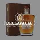 Bottle with wooden cork stands next to wooden crate; inscription: DELLAVALLE, 15 years, Distilleria.