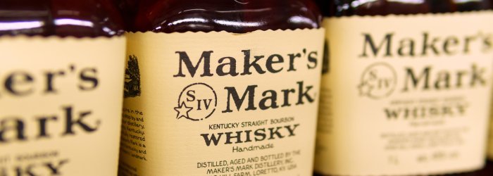 Bottles - standing side by side - shelf, labeled as "Maker's Mark Kentucky Straight Bourbon Whisky".